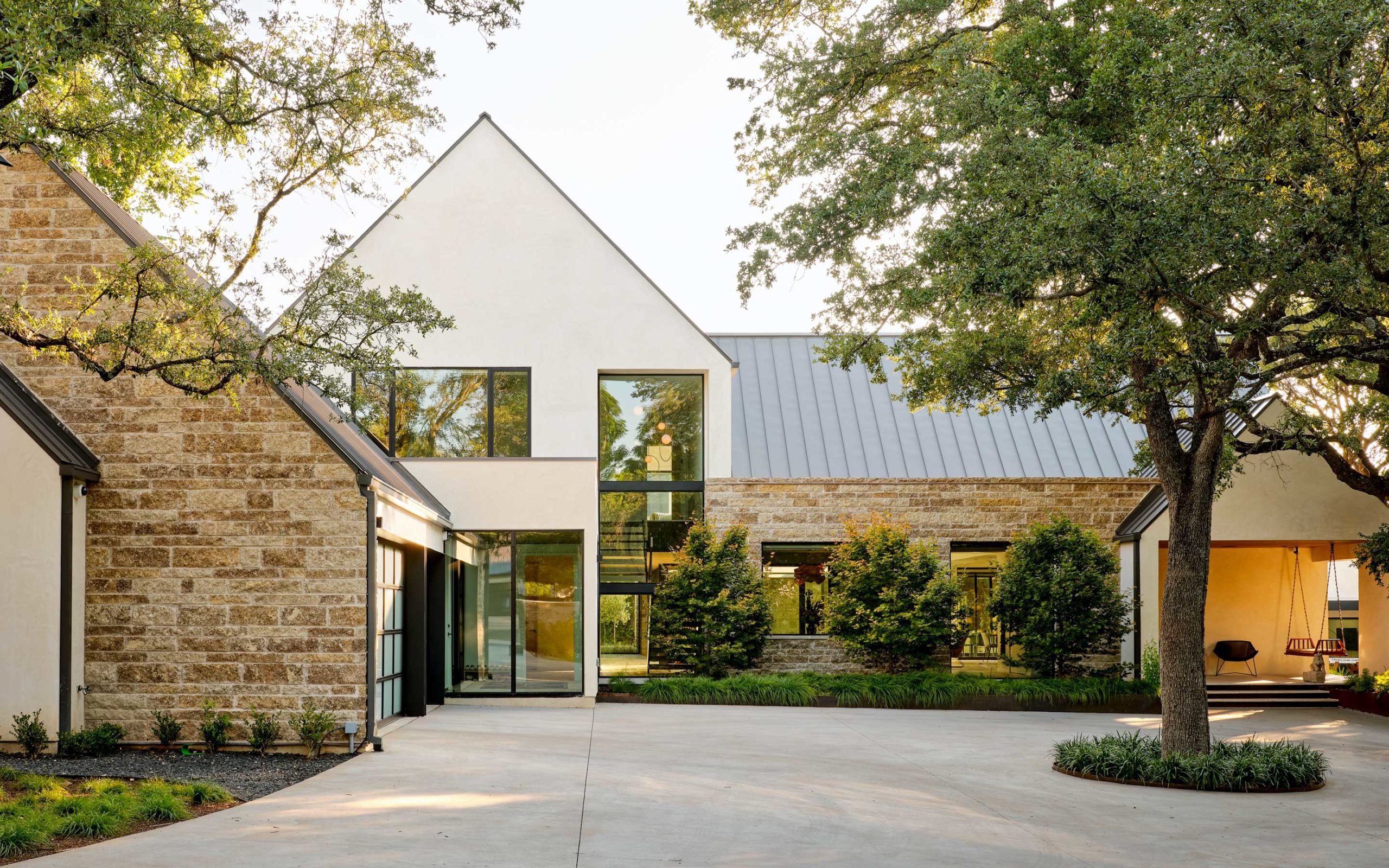 A modern Austin home bathed in golden-hour light