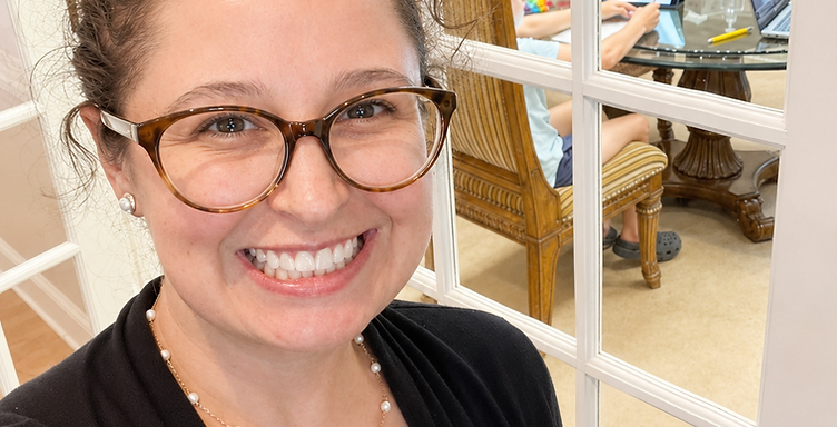 Niki, Mighty Oaks educational consultant, welcoming a family in a warm home learning space