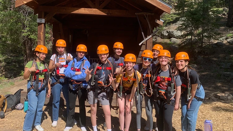 Young Life group geared up for a zipline adventure