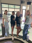 Students at Odysea Aquarium in front of a stingray exhibit
