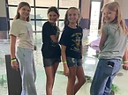 Students at Odysea Aquarium in front of a stingray exhibit