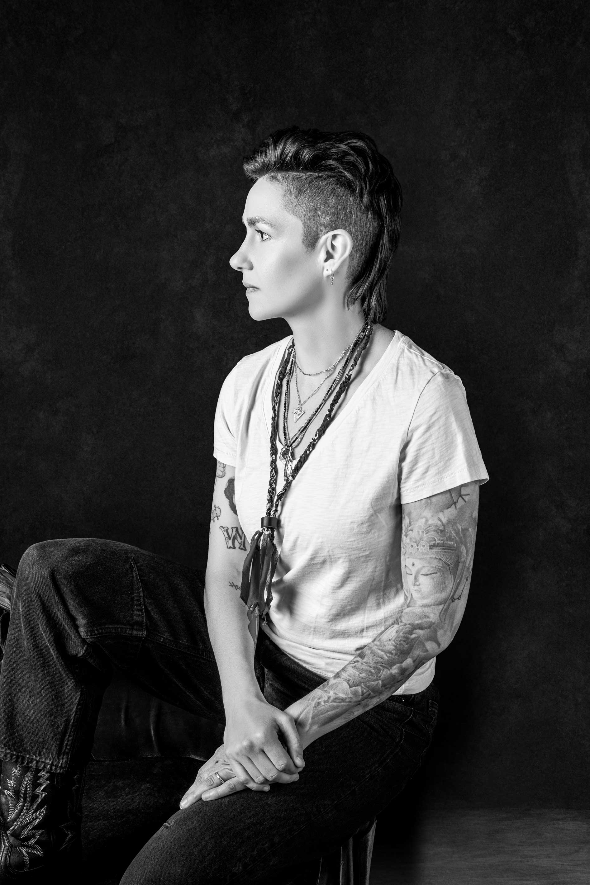 Emily McLoud black and white studio portrait, seated side profile, Jennifer Lindberg photographer
