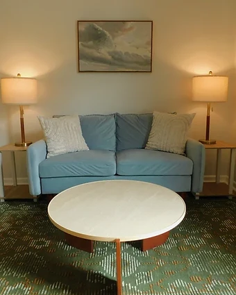 A quiet loveseat and soft seating in the San Antonio therapy office