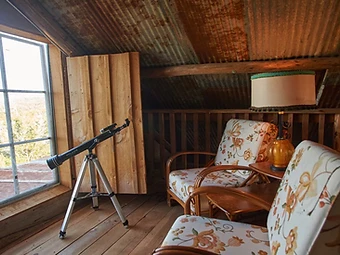 Quiet seating nook with a view at Camp Milagro