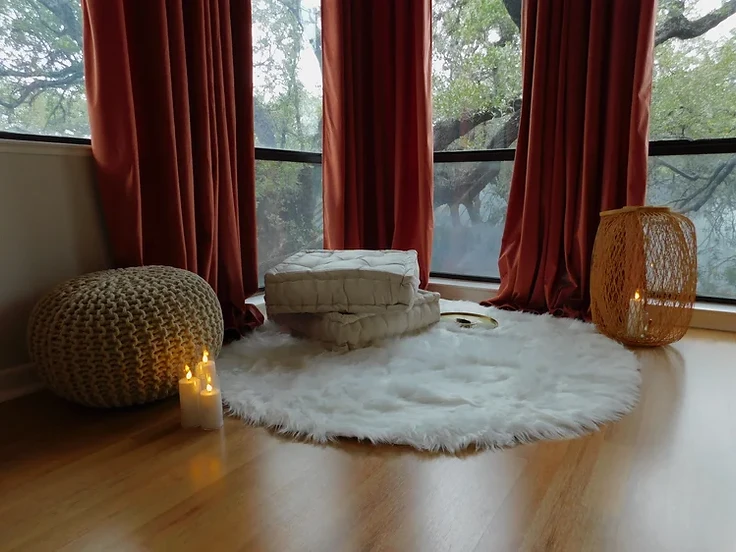 Private therapy office with floor seating, cushions and large windows in San Antonio