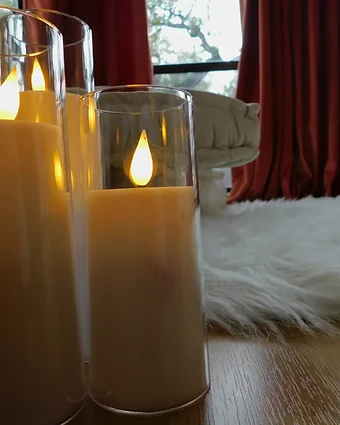 A warm candlelight detail in the San Antonio therapy office