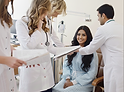 AtomicMedX care team reviewing a care plan with a patient