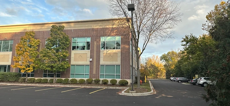 AtomicMedX clinic front view at golden hour