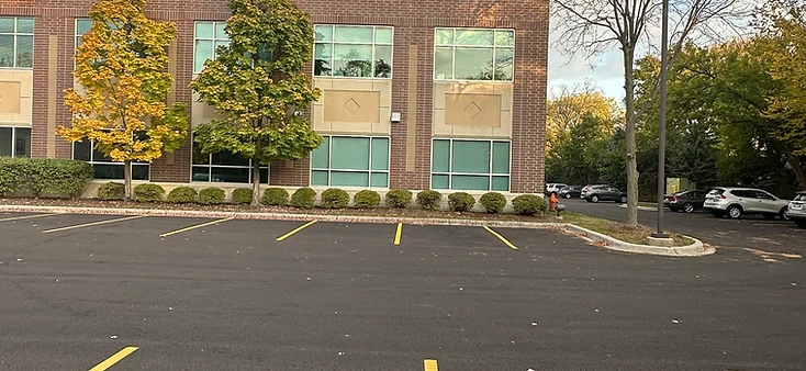 AtomicMedX clinic two-story brick facade