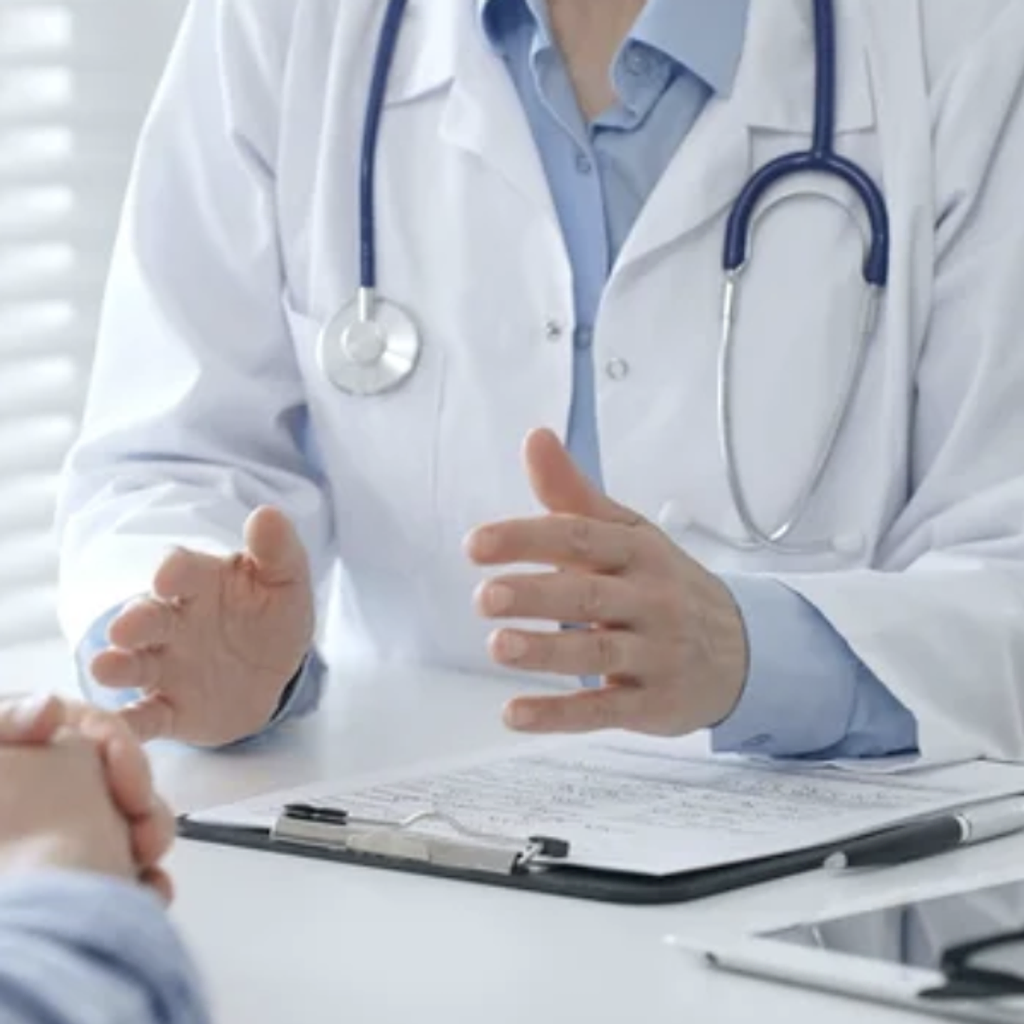 AtomicMedX clinician explaining a care plan to a patient