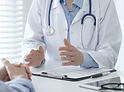 AtomicMedX clinician explaining a care plan to a patient