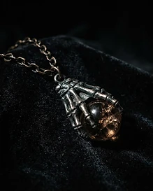 The Gripping Hand — Reliquary Pendant