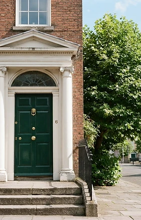 A classic Georgian Dublin doorway with a deep green door