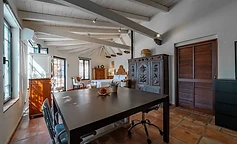 Bedroom with carved wardrobe and work table