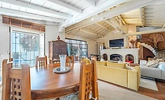 Round table and dining area beside the living room