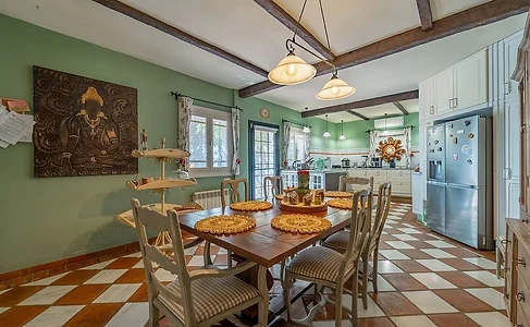 Dining table on a checkered floor