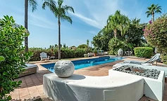 White curves and turquoise water in the garden