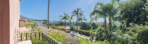 Terrace overlooking the garden and pool