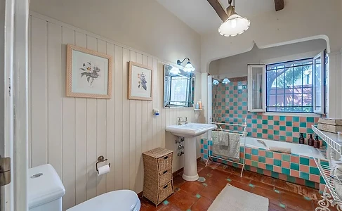 Vintage bathtub with checkered tiles