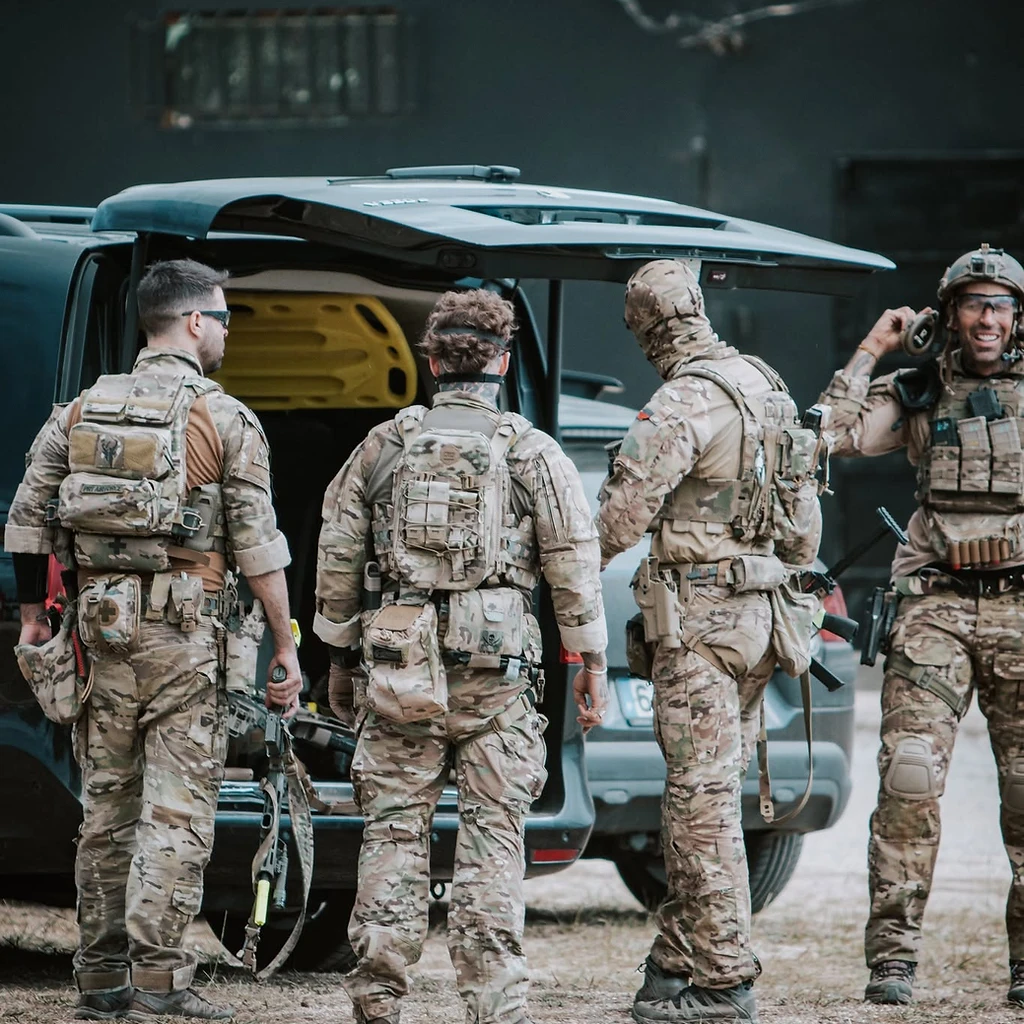 T13 ASSOC team preparing gear at a tactical operation