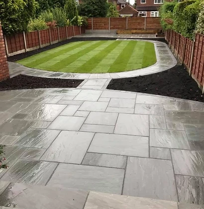 Multi-Level Stone Patio & Striped Lawn