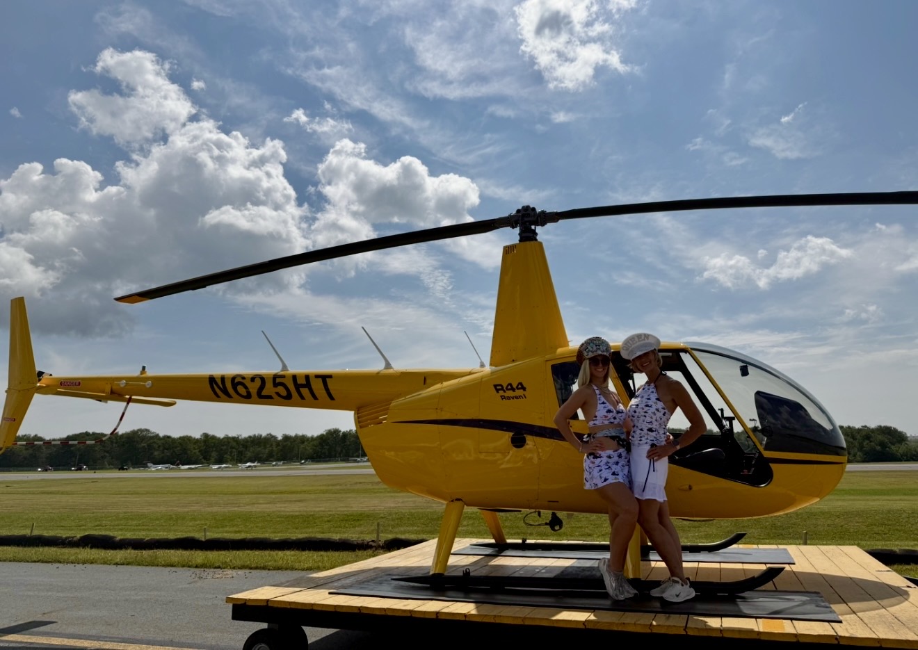 Kara Sincavage and Pilot Diamond in front of R44 helicopter