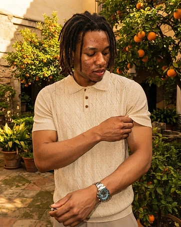 Noah wearing Tencel Linen Knitted Polo Shirt