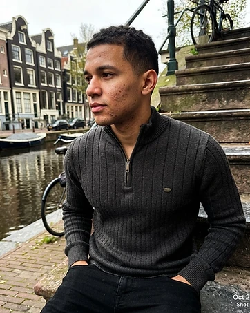 James wearing Zipper Knit Sweater