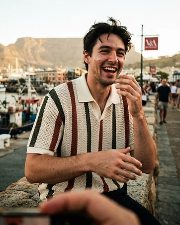 Alex wearing Geometric Color Block Polo Shirt