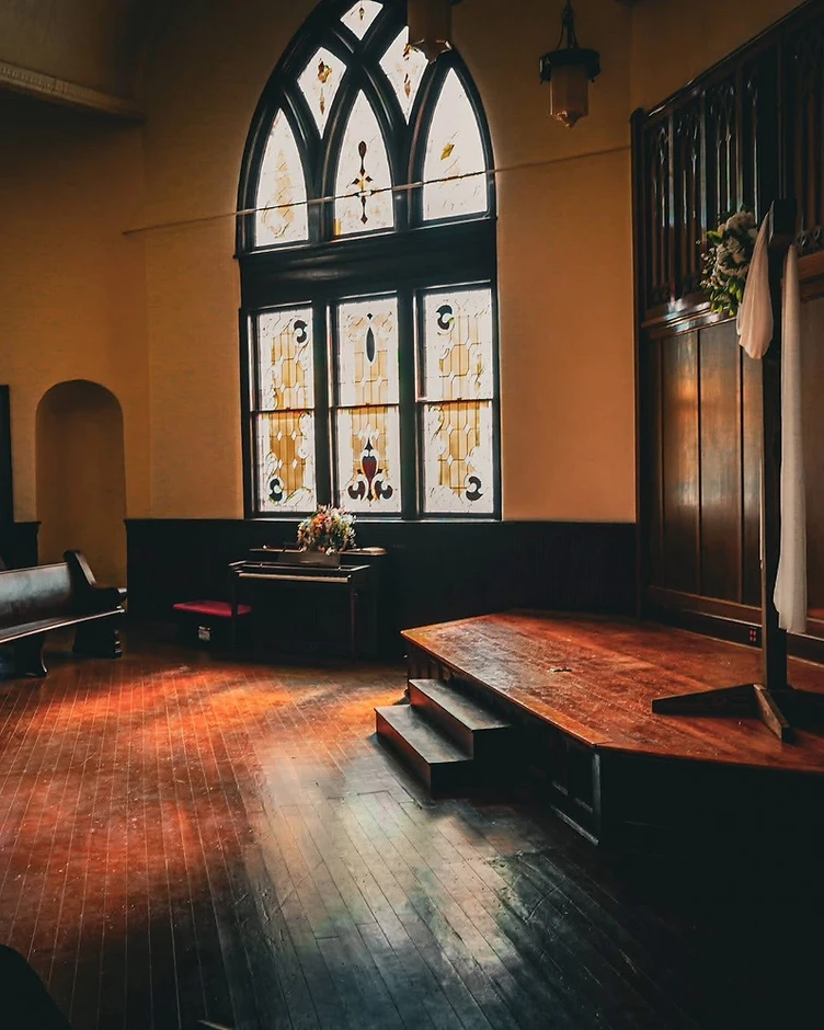 The chapel interior with stained glass