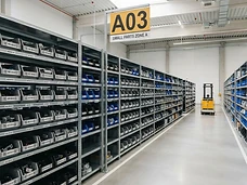 Warehouse shelf with parts and labels