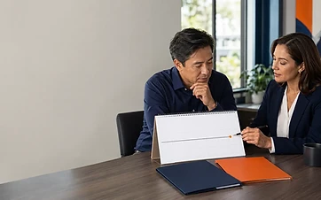 Policyholder and insurance educator reviewing a term-life conversion timeline