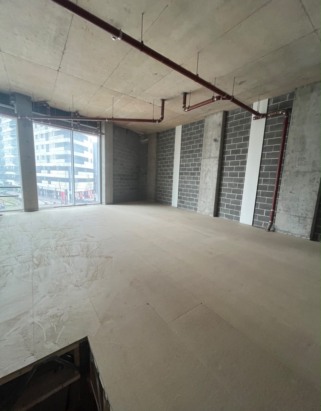 Commercial interior fit-out with structural carpentry and fire sprinkler installation