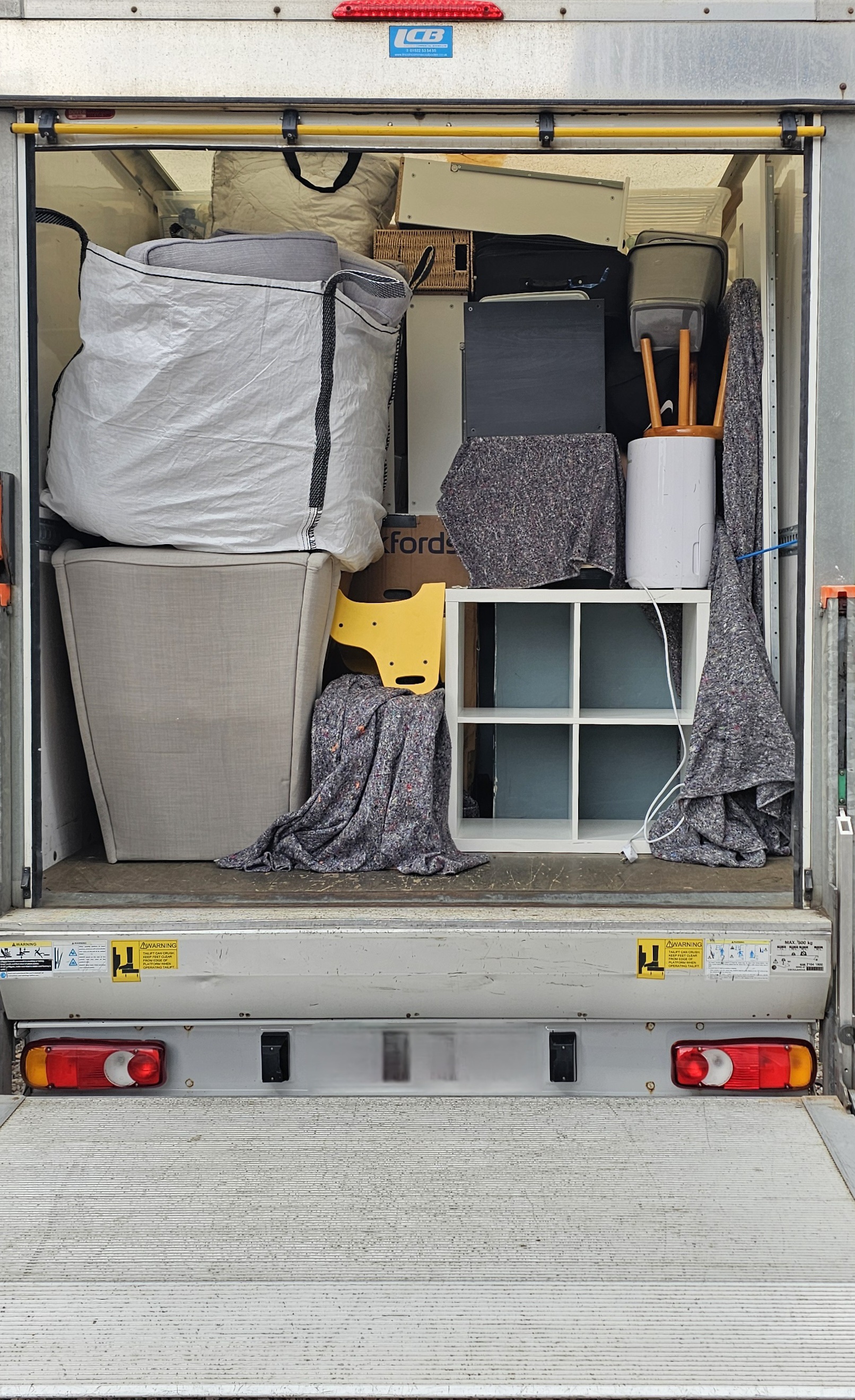 Luton van loaded with furniture and protected items ready for transport
