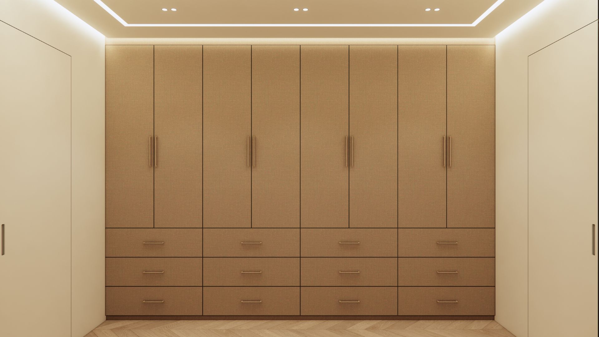 Wardrobe wall in linen-textured joinery with eight full-height doors, slim brushed handles, twelve drawers below, cove lighting above and herringbone flooring