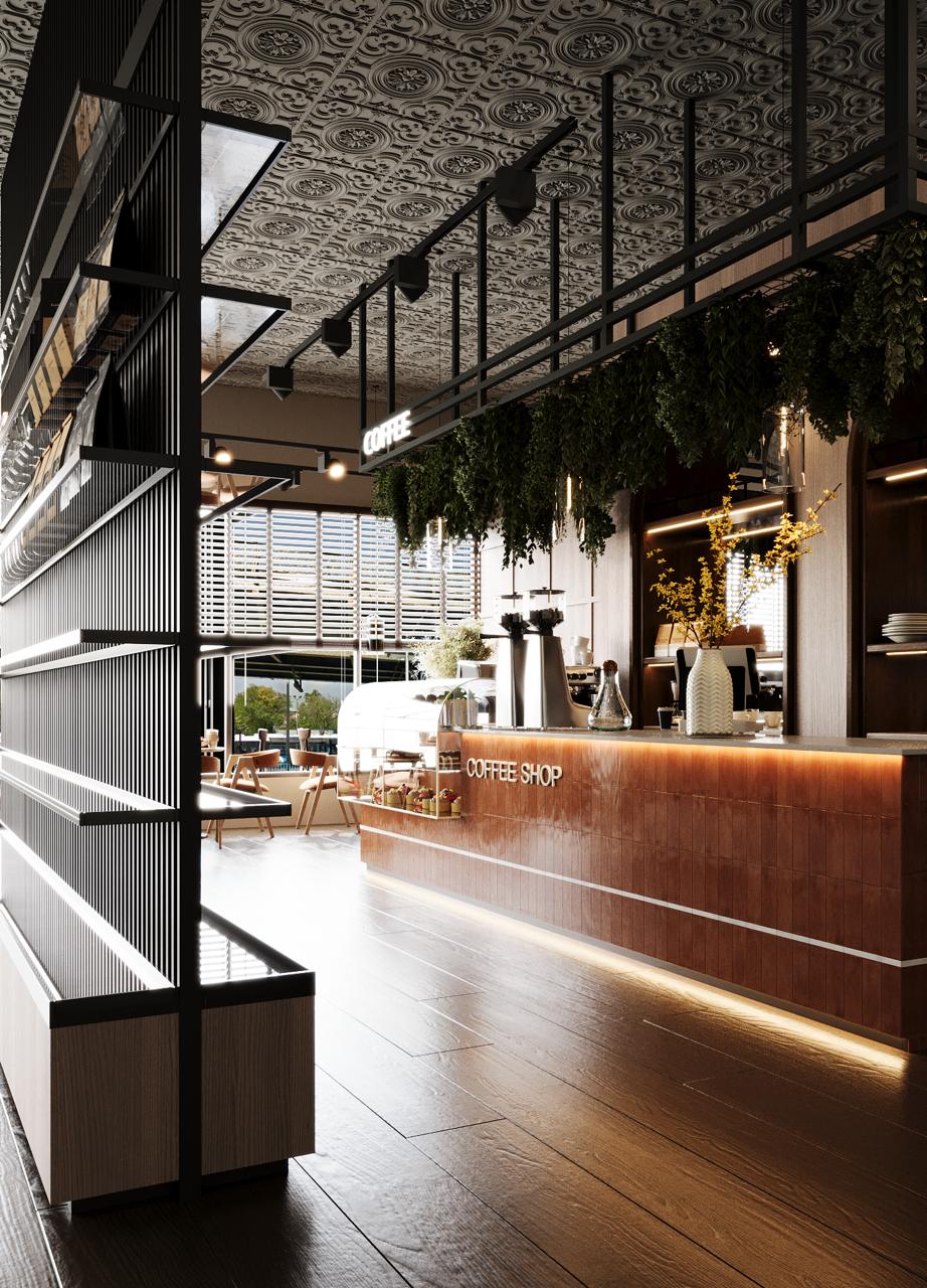 Long view down the coffee bar with an under-lit terracotta timber counter, blackened steel display shelving in the foreground, hanging greenery, louvred windows onto the street and a pressed-tin ceiling