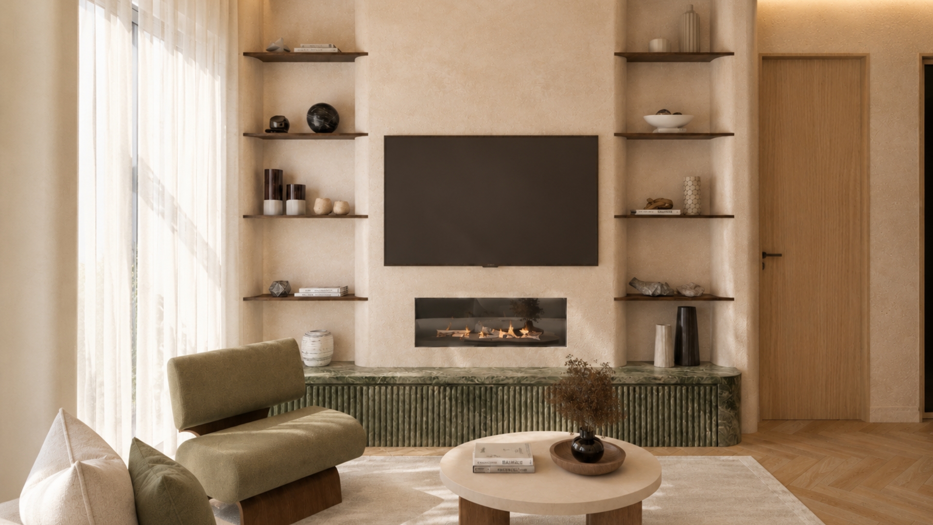 Living room media wall in warm plaster with slim walnut shelves either side, a wall-mounted screen above a linear fire, fluted green marble plinth, olive chair and sheer curtains at tall glazing