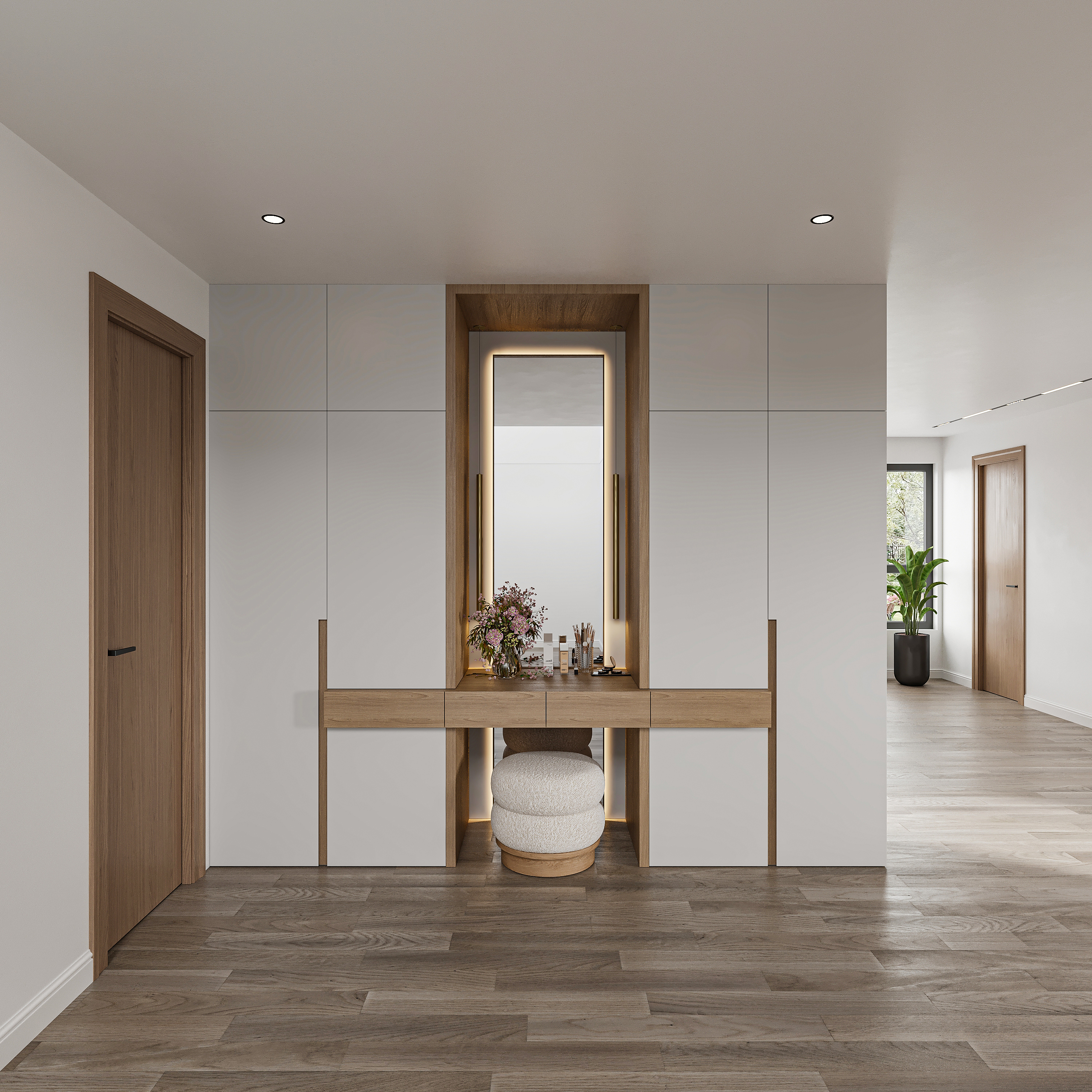 Dressing area with full-height white wardrobe doors framed in oak, a backlit mirror niche over a slim oak vanity, boucle stool and a wide corridor with planting beyond