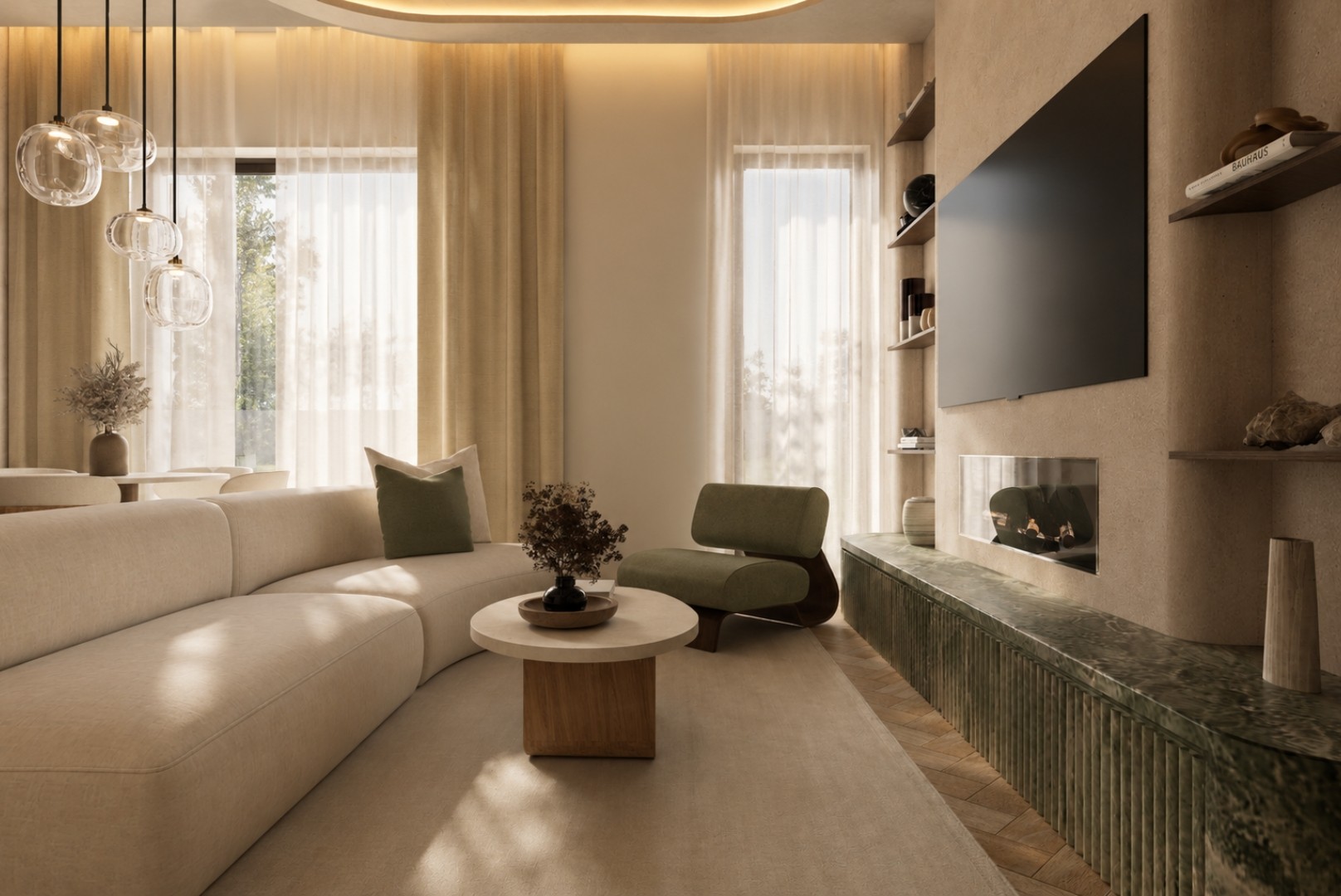 Living room in raking sunlight with a curved ivory sofa, olive lounge chair, round oak coffee table, green marble plinth with linear fire and clustered glass globe pendants over the dining table beyond