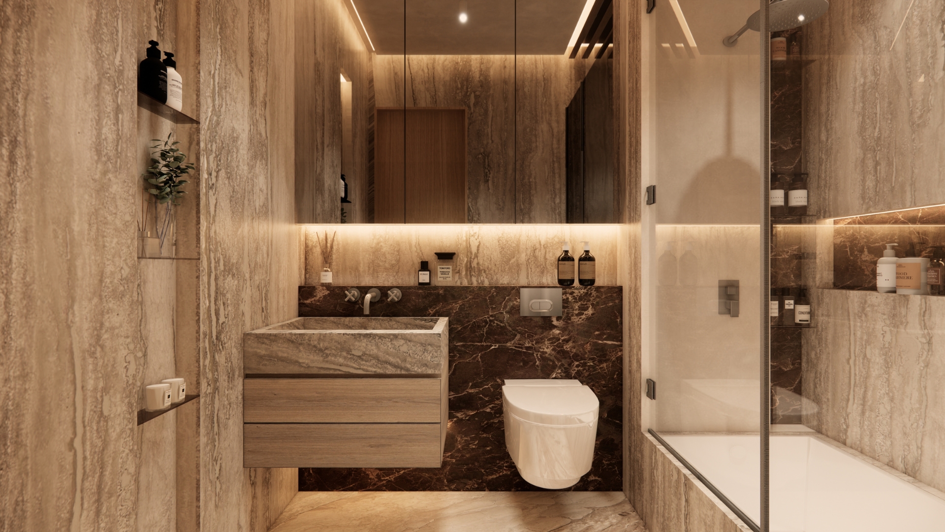 Bathroom lined in vein-cut travertine with a carved stone basin on a floating oak vanity, dark brown marble band behind a wall-hung WC, backlit mirror cabinet, slim stone shelves and a glass-screened bath with rain shower