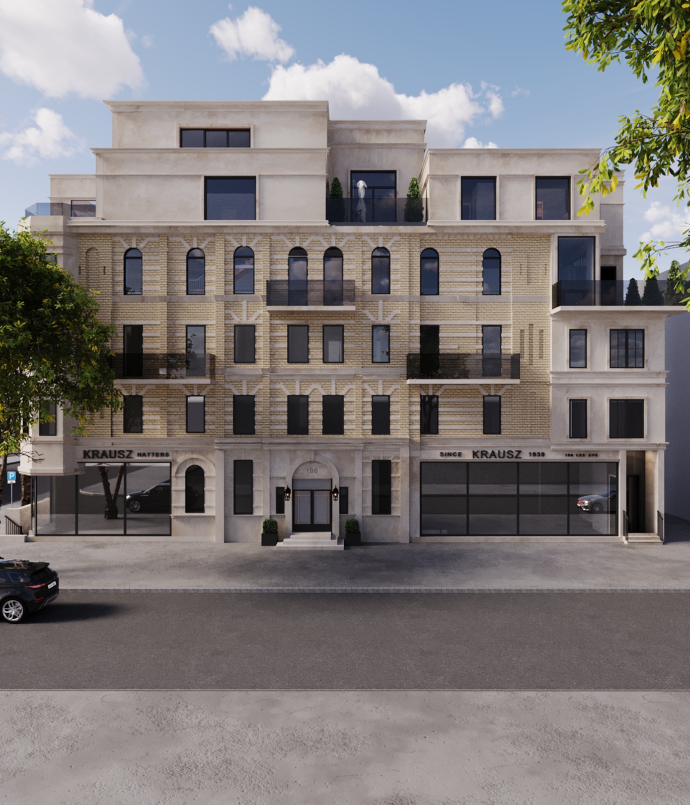 Front elevation in buff brick with cast-stone chevron banding, arched upper windows, recessed balconies, an arched stone entry with lanterns and twin glazed shopfronts either side beneath set-back penthouse terraces