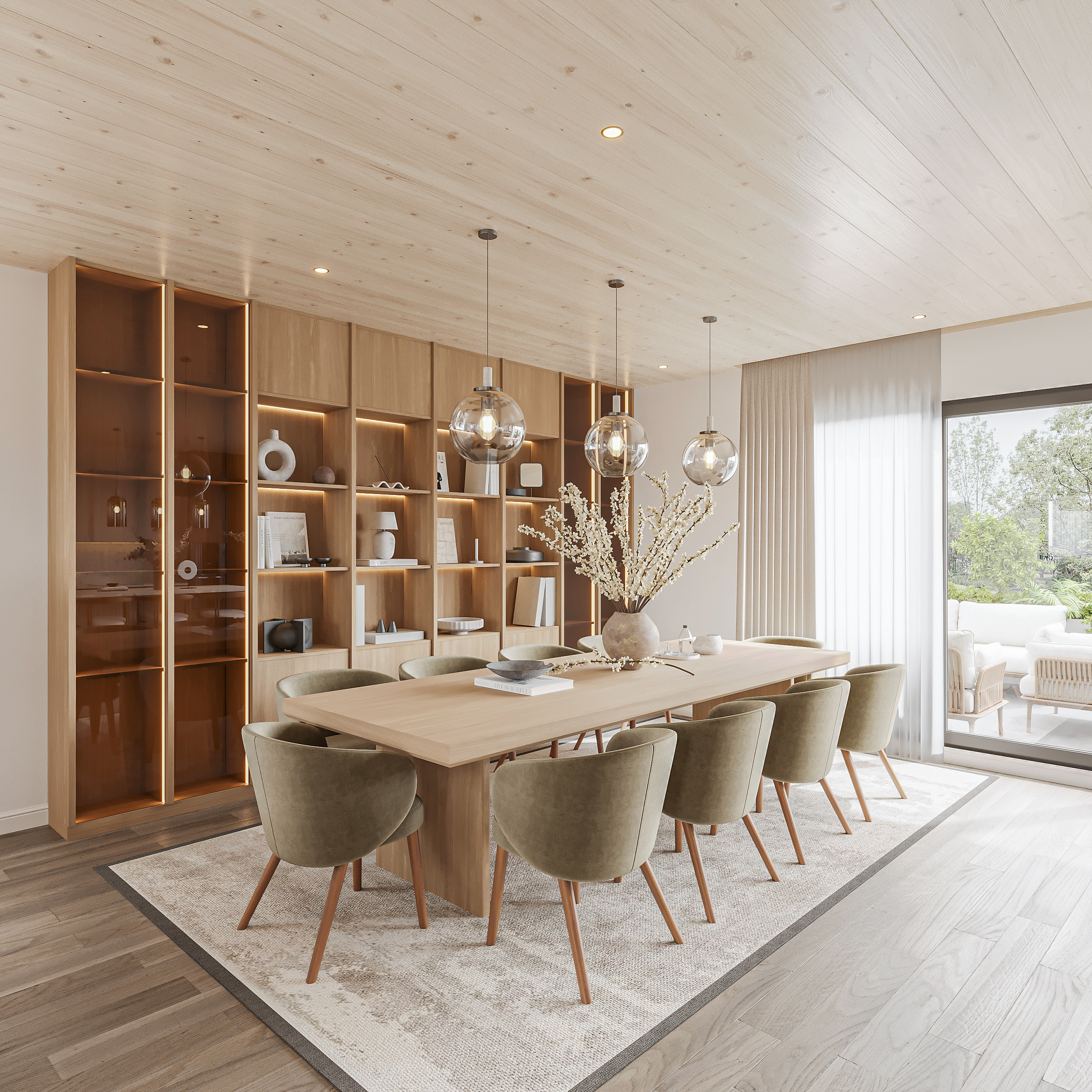 Dining room with a long oak table and olive velvet chairs, a full-height LED-lit oak display wall with glass-fronted cabinets, three glass globe pendants and sliding glazing onto the terrace