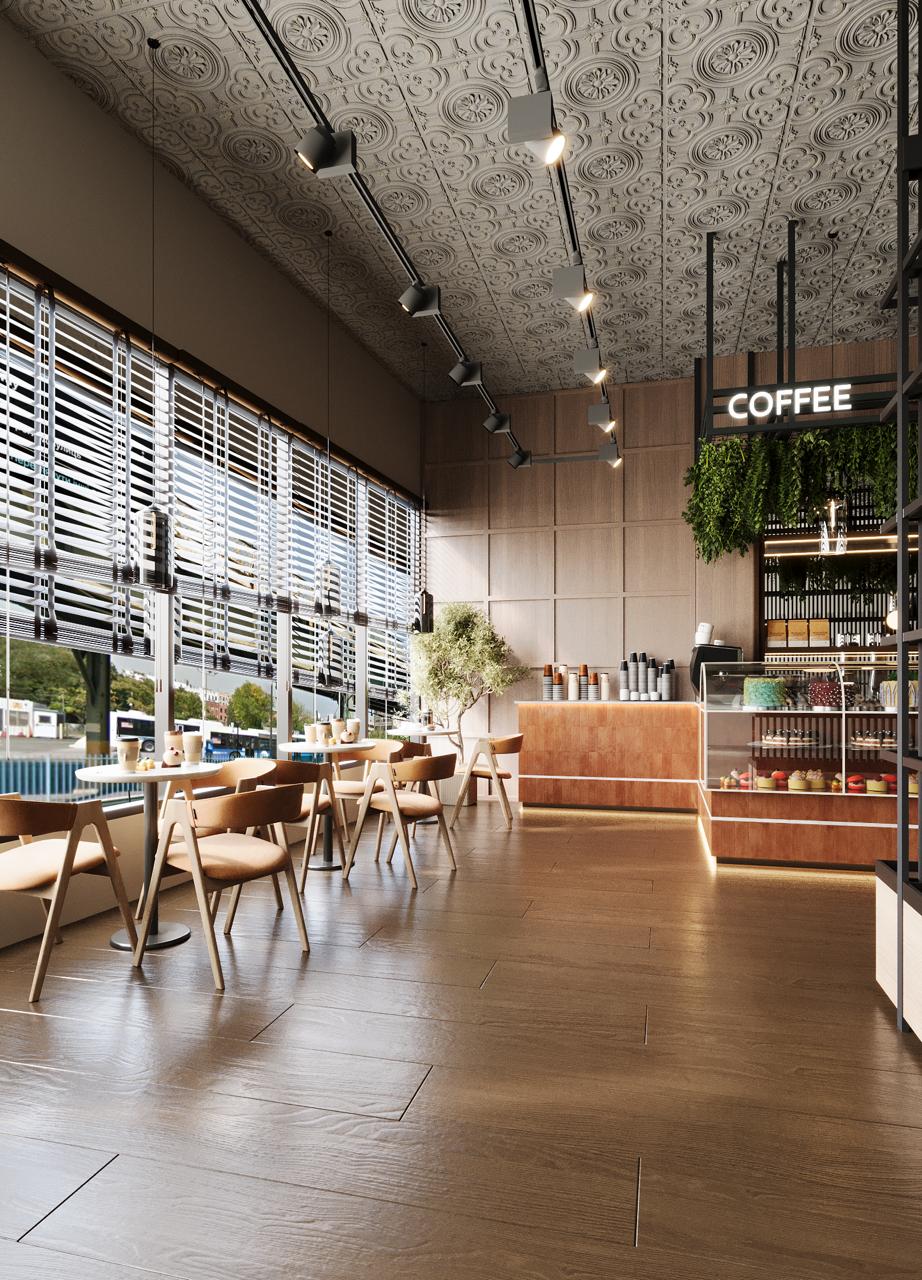 Café seating along a wall of louvred windows with round tables and tan leather chairs, a banquette, potted olive tree, black track lighting under a pressed-tin ceiling and the coffee counter beyond