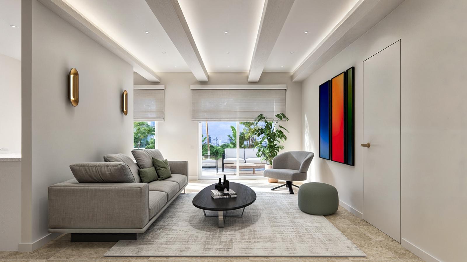 Living room with a deep grey linen sofa and olive cushions, paired brass tubular wall sconces, a black oval coffee table, grey swivel chair, sage pouf and the colour-field triptych beside a concealed door