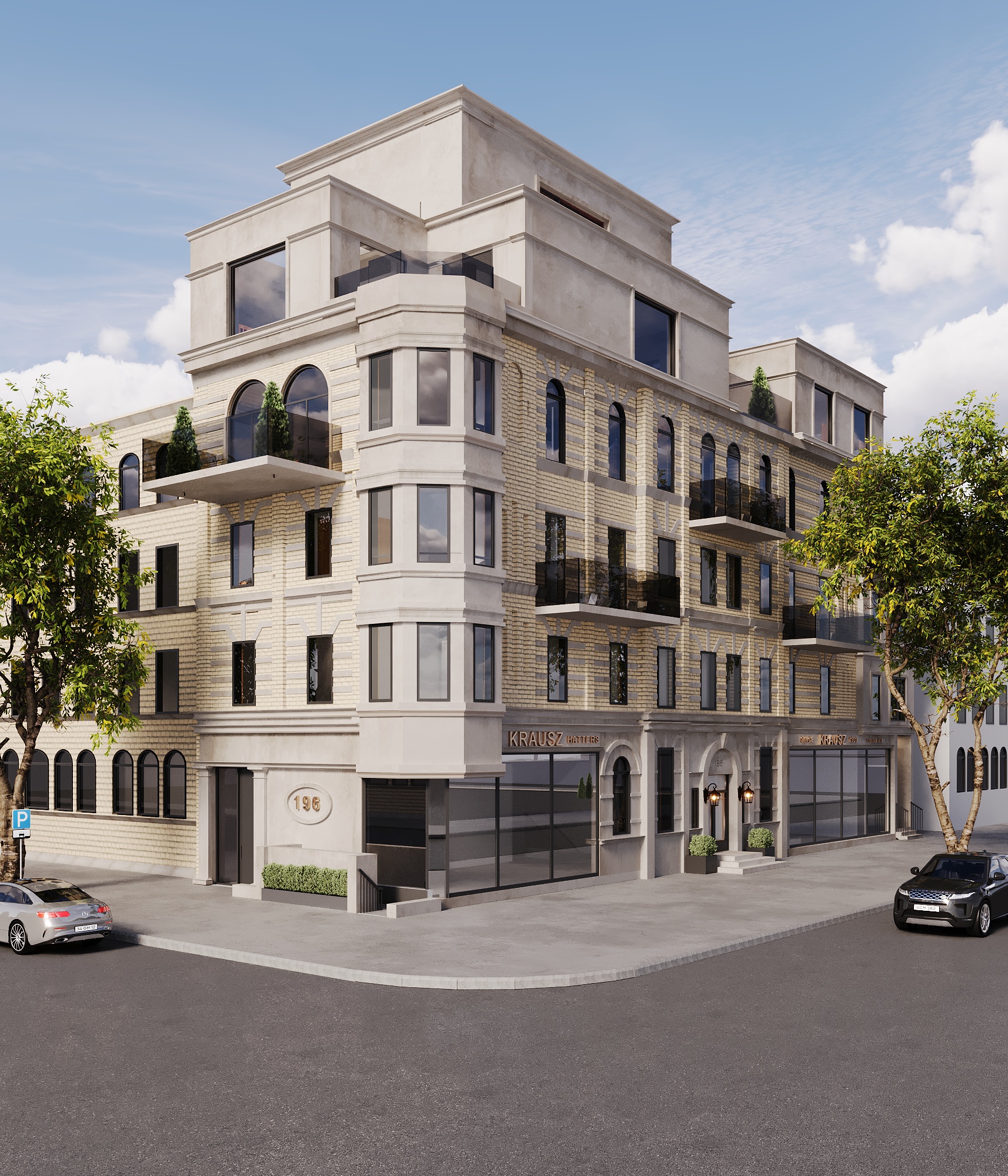 Wide corner view of the completed building with its chamfered bay, arched top-floor windows, planted balconies, set-back penthouse level and cast-stone retail base along the sidewalk