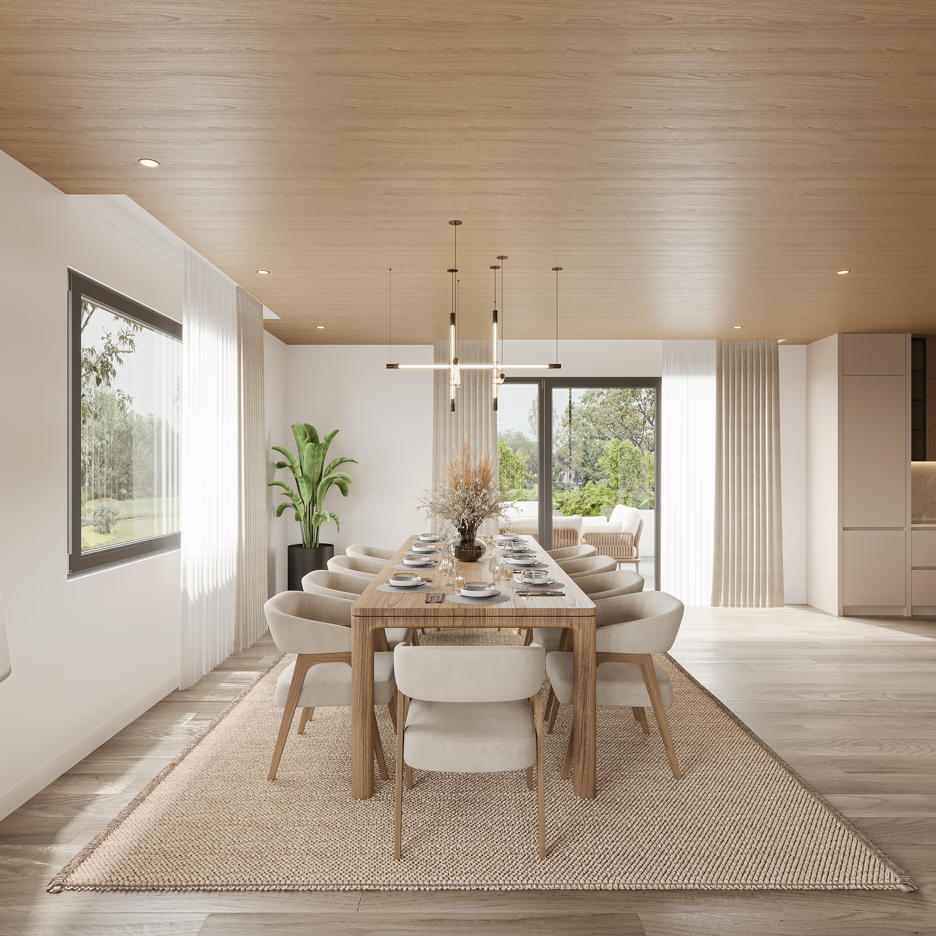 Dining room in soft white with a reeded oak table set for eight, curved cream armchairs on a woven rug, layered linear pendants and sheer curtains at sliding doors onto a covered terrace