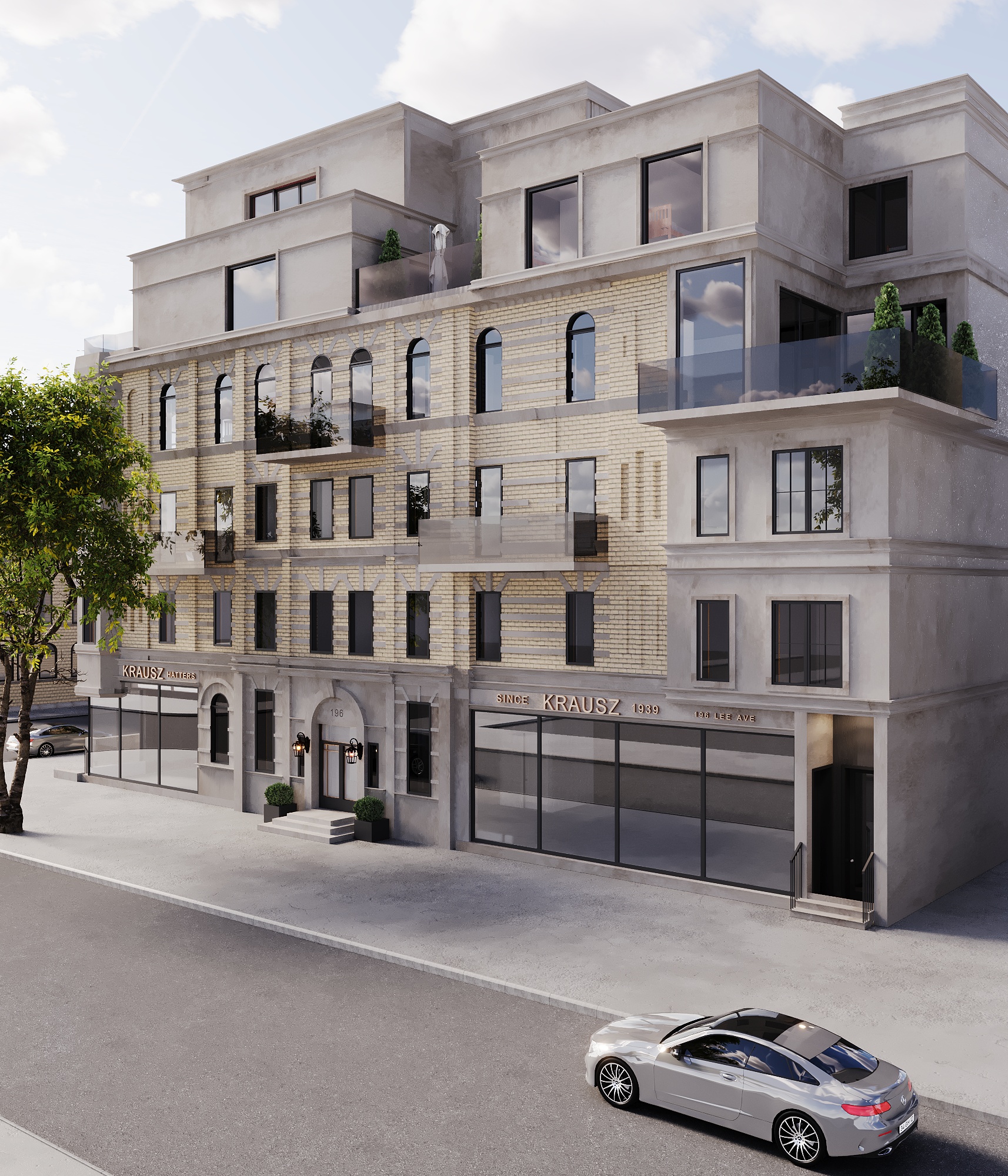 Raised view of the building's stepped massing — buff brick mid-levels, cast-stone base and set-back rendered upper floors with glass-balustraded terraces above the retail frontage