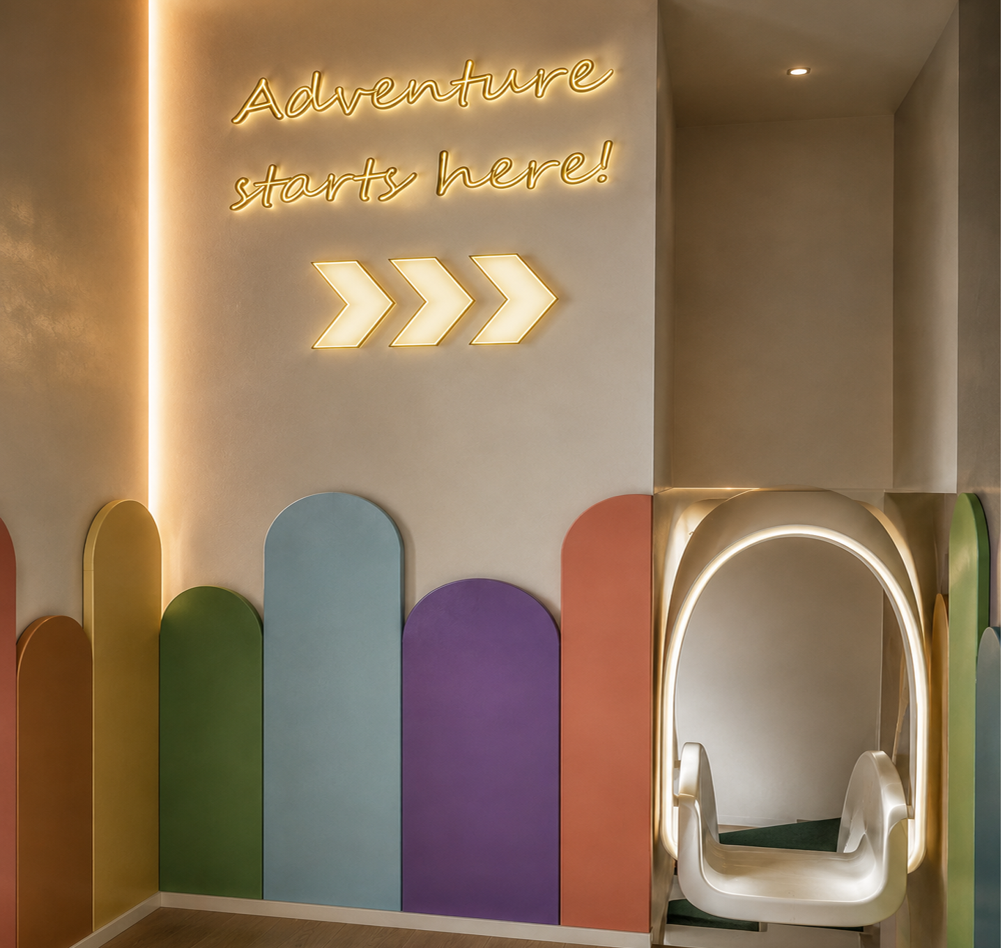 Playroom slide entrance with a backlit neon 'Adventure starts here!' sign and arrow, a wainscot of coloured arched panels and a lit archway onto the slide platform