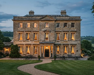The Georgian facade of Dovecliff Hall at dusk