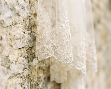 Bridal veil detail against the stone of Dovecliff Hall